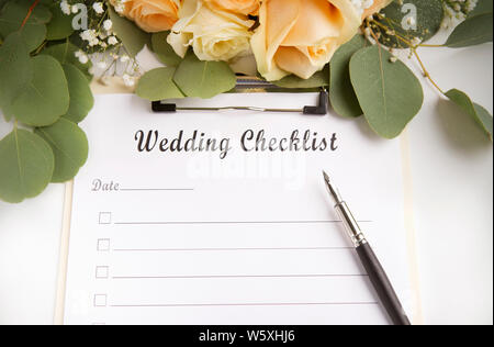 Hochzeit Planung Checkliste mit Leerzeichen und Rosen Stockfoto