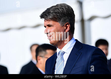 Harald Krüger, CEO und Vorsitzender des Vorstands der BMW AG, nimmt an der Eröffnungsfeier für BMW Brilliance Tiexi neues Werk in Shenyang City Stockfoto