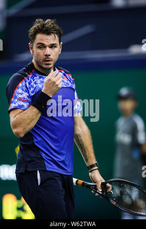 Stan Wawrinka der Schweiz reagiert, als er konkurriert gegen Borna Coric von Kroatien in die erste Runde der Männer singles während der Rolex Sha Stockfoto