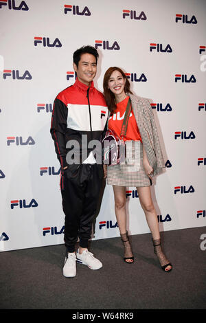 Hong Kong US-amerikanischer Schauspieler und Sänger Kevin Cheng, Links, und Hong Kong geborene kanadische Schauspielerin Grace Chan nehmen an der Fila fashion show während der 2019 Spr Stockfoto