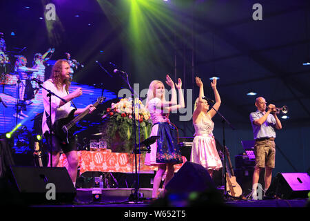 Die hausband der Oktoberfest München live Konzert während der China Tour der Oktoberfest München, einem der renommiertesten der Welt Bier fes Stockfoto