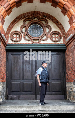 Kapernaum Kirche, Lutherische evangelische Kirche. Rotes Backsteingebäude von Architekt Carl Siebold im neuromanischen Stil in Wedding-Berlin. Stockfoto