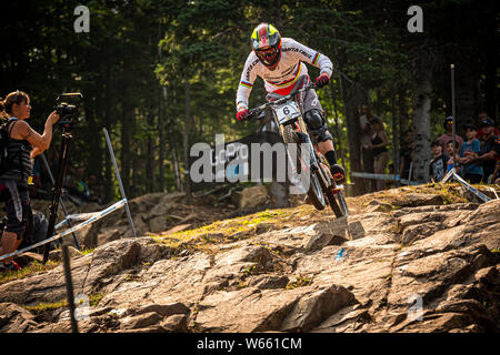 AUGUST 2, 2014 - Mont Sainte Anne, Kanada. Greg Minnaar Racing an der UCI Mountainbike Downhill World Cup. Stockfoto