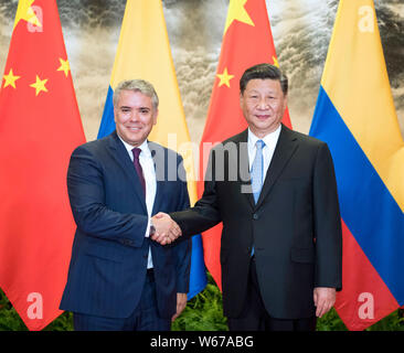 Peking, China. Juli 31, 2019. Der chinesische Präsident Xi Jinping (R) Gespräche mit Besuch der kolumbianische Präsident Ivan Duque Marquez in der Großen Halle des Volkes in Peking, der Hauptstadt von China, 31. Juli 2019. Credit: Li Xueren/Xinhua/Alamy leben Nachrichten Stockfoto