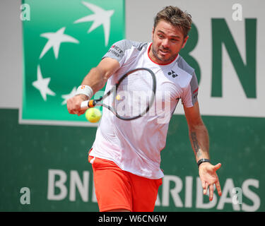 Swiss tennis player Stan Wawrinka spielt Rückhand geschossen im French Open 2019 Tennis Turnier, Paris, Frankreich Stockfoto