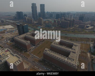 Luftaufnahme von zwei symmetrischen Gebäude mit der Form des arabischen Ziffer 6 in Zhengzhou City, Central China Provinz Henan, 21. März 2018. Stockfoto