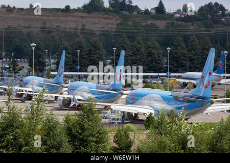 Drei nicht gelieferten 737 MAX Flugzeuge für TUI Airways im Boeing Werk 2 Werk Mitarbeiter Parkplatz am 30. Juli 2019. Stockfoto