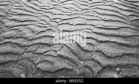 Abstrakte schwarz-weiß Textur Hintergrund. Sand am Meer Muster Textur. Wave line Textur Kunst Stockfoto