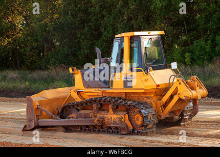 Bulldozer in Aktion auf einer Baustelle Stockfoto