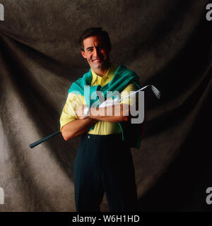 Mann im Golfoutfit Stockfoto