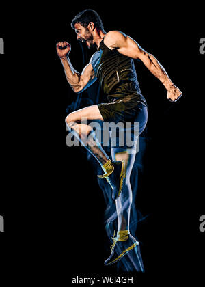 Eine kaukasische player Mann trainieren Fitness Cardio Boxing übung Body Combat studio Schuß auf schwarzen Hintergrund mit Licht malen blur Effekt isoliert Stockfoto