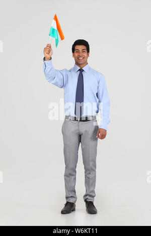 Executive mit einem indischen Flagge Stockfoto