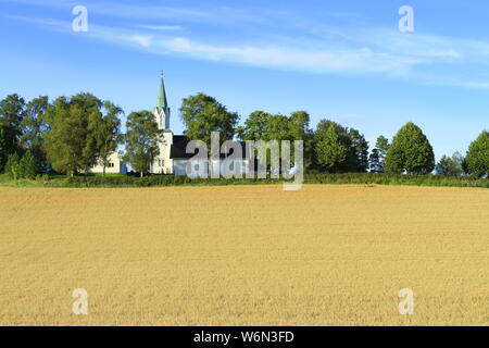 Church on wheat field Stockfoto