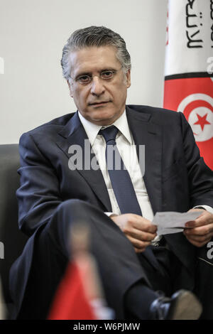 Tunis, Tunesien. 02 Aug, 2019. Tunesischen Medien Magnat und Präsidentschaftskandidaten Nabil Karoui legt seine Kandidatur an Der Tunesien Wahlkommission vor der 2019 tunesischen Präsidentschaftswahl, geplant am 15. September 2019 zu übernehmen. Die Wahlen waren ursprünglich geplant am 17. und 24. November vor dem Tod von Präsident Beji Caid Essebsi am 25. Juli 2019 stattfinden. Credit: Khaled Nasraoui/dpa/Alamy leben Nachrichten Stockfoto