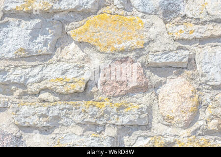 Licht Fragment einer alten Steinmauer für die Verwendung als Zusammenfassung Hintergrund und Textur. Stockfoto