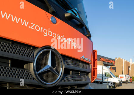 Zorgboodschap Truck. Zorgboodschap liefert Lebensmittel, (Diät) Mahlzeiten und Hausrat an 6 Tagen in der Woche auf mehr als 4.000 Kunden. Stockfoto