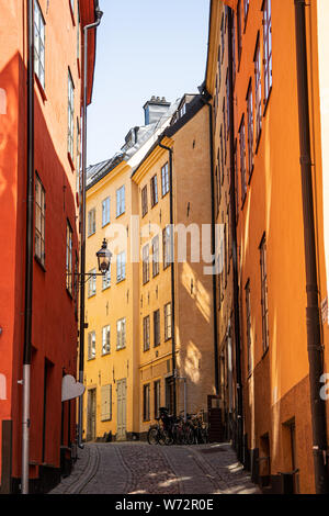 Alte terrakottafarbenen Gebäude in der Gamla Stan (Altstadt), Stockholm, Schweden Stockfoto