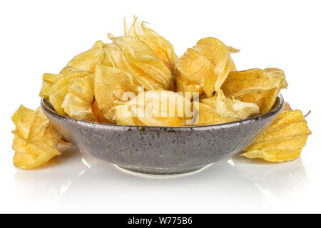 Menge ganze Frische orange Physalis in dunklen Keramik Schüssel auf weißem Hintergrund Stockfoto