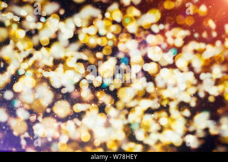 Abstrakte festlichen Hintergrund. Glitter vintage Lichter Hintergrund mit Lichtern Defokussierten. Weihnachten und Neujahr fest bokeh Hintergrund mit Copyspace. Stockfoto