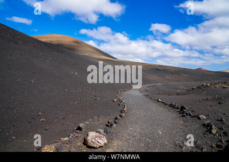 Spanien, Lanzarote, schönen Wanderweg neben Vulkan El Cuervo in Timanfaya Bereich Stockfoto