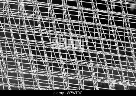 Industrie Stahl chain Link fencing. Nahaufnahme Stahldraht net Textur für Hintergrund. Stockfoto