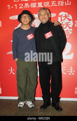 Hong Kong Schauspieler Stephen Chow, Links, und Regisseur Tsui Hark einer Pressekonferenz für ihren Film "Reise in den Westen: die Dämonen erobern' in H teilnehmen Stockfoto