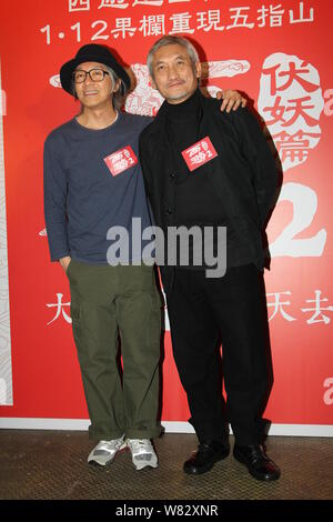 Hong Kong Schauspieler Stephen Chow, Links, und Regisseur Tsui Hark einer Pressekonferenz für ihren Film "Reise in den Westen: die Dämonen erobern' in H teilnehmen Stockfoto