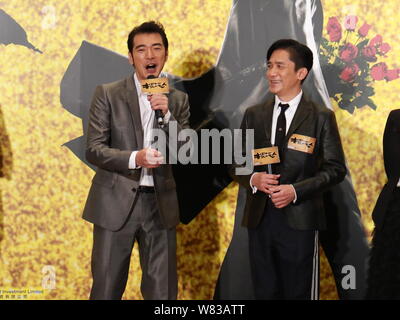 Hong Kong Schauspieler Tony Leung Chiu-wai, rechts, und Taiwanese-Japanese Schauspieler Takeshi Kaneshiro besuchen eine Charity Premiere für EE-Yo ist Ihr neuer Film Stockfoto