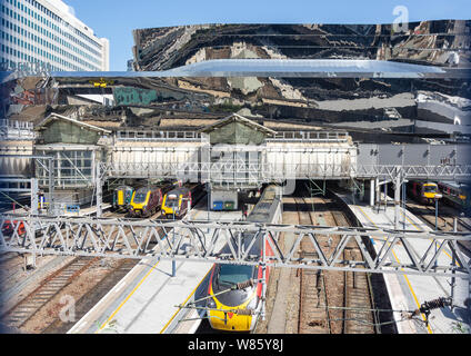 Züge auf Plattformen am Bahnhof Birmingham New Street, Birmingham, West Midlands, England, Großbritannien Stockfoto