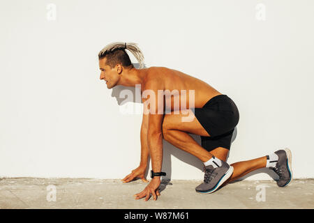 Passen Mann bereit für die Ausführung Stockfoto