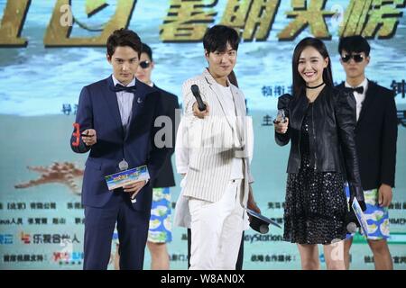 (Von links) Chinesische Schauspieler Jones Xu, Südkoreanischer Schauspieler Lee Min-ho und chinesische Schauspielerin Tang Yan Besuchen die Premiere ihres neuen Films "Kopfgeldjäger" Stockfoto