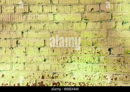 Alte bemalte Mauer braune und grüne Farben aus der Nähe. Zusammenfassung Hintergrund Stockfoto