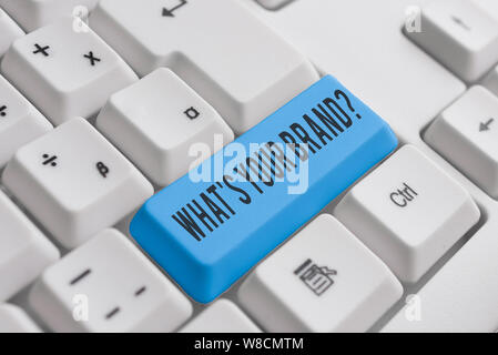 Wort Schreiben von Text, was Ihre Marke Frage. Business Foto zur Schau stellen Fragen über das Produkt Logo hat oder was Sie Weiß pc-Tastatur kommunizieren mit Stockfoto