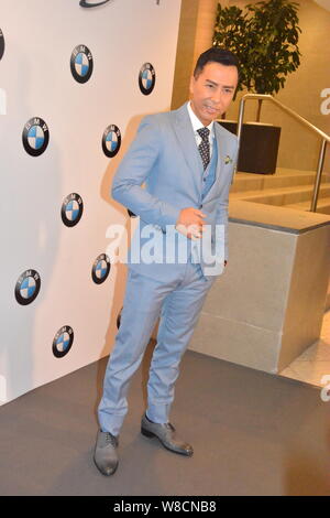 Hong Kong Darsteller Donnie Yen Posen an der BMW Hong Kong Derby 2015 in Hongkong, China, 15. März 2015. Stockfoto