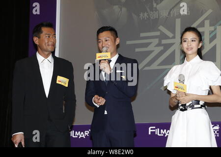 (Von links) Hong Kong Schauspieler Louis Koo, Shawn Yue und chinesische Schauspielerin Tong Liya nehmen an der Premiere für ihren neuen Film "wilde Stadt" während der 39 H Stockfoto