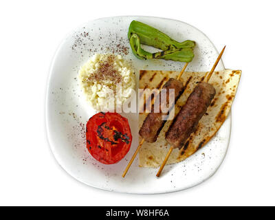 Shish Kebab oder Adana Kebab im Schwarzen wallpaper Stockfoto