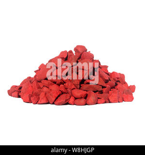 Ein Haufen von Orange Steine für die Dekoration. Kies isoliert auf weißem Hintergrund. Stockfoto