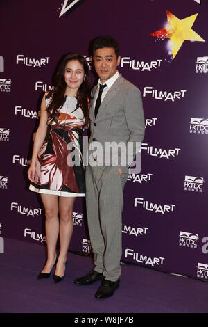 Hong Kong Schauspielerin Michelle Ye, Links, und Schauspieler Sean Lau stellen während einer Pressekonferenz für ihren neuen Film "Wahnsinn" in Hongkong, China, 24. März 20 Stockfoto