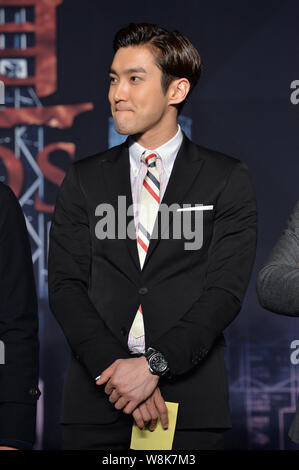 Koreanische Schauspieler Choi Siwon nimmt an einer Pressekonferenz zu seinem neuen Film 'Helios' in Peking, China, 9. März 2015. Stockfoto