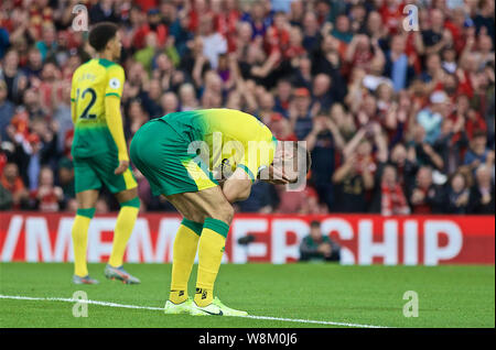 Liverpool, Großbritannien. 9 Aug, 2019. Norwich City Grant Hanley reagiert während der Englischen Premier League Spiel zwischen Liverpool und Norwich City bei Anfield in Liverpool, Großbritannien auf August 9, 2019. Liverpool gewann 4-1. Quelle: Xinhua/Alamy leben Nachrichten Stockfoto