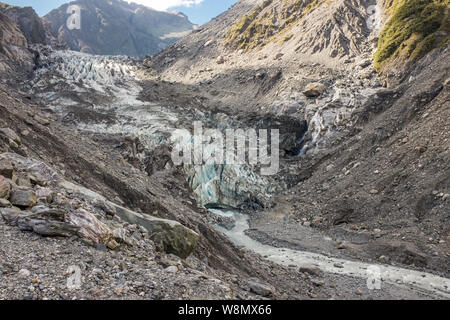 Wandern durch das karge und raue Landschaft, dem Leiter der Franz Josef Gletscher in Neuseeland niemand im Bild führt Stockfoto