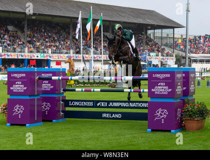 Dublin, Irland, 09. August 2019. Cian O'Connor für Team Irland konkurrieren für den Aga Khan Schale in der longines Nations Cup Springreiten am RDS Dublin Horse Show. Quelle: John Rymer/Alamy leben Nachrichten Stockfoto