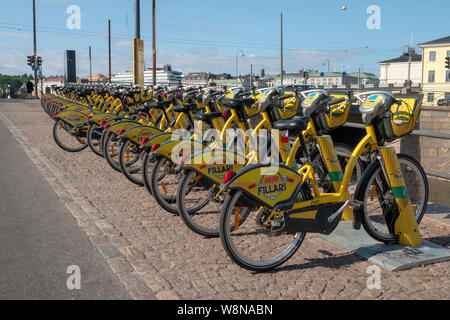 Ein Rack mit Fahrräder zur Miete in der Stadt Helsinki, Finnland. Stockfoto