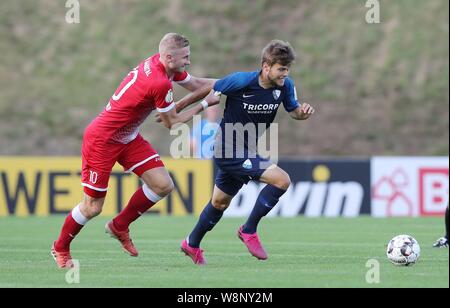 Baunatal, Deutschland. 10 Aug, 2019. firo: 10.08.2019, Fußball, DFB-Pokal, Saison 2019/2020, Runde 1, KSV Baunatal - VfL Bochum Baumgartner, Bochum recht versus SCHAEFER | Verwendung der weltweiten Kredit: dpa/Alamy leben Nachrichten Stockfoto