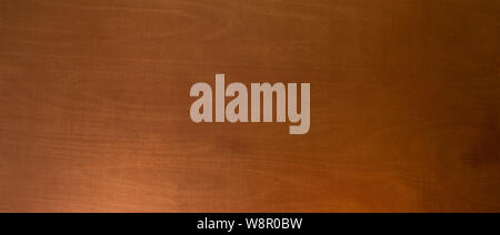 Natürliche glatte Holz Textur farbige mit dunkelbraunen Farbverlauf als Hintergrund zu beleuchten. Mit kopieren. Stockfoto