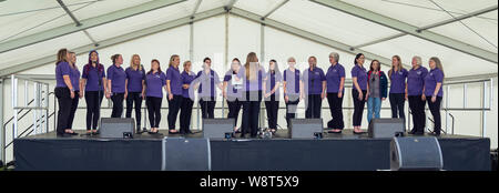 Fort George, Inverness, Schottland, 10. August 2019. Mitglieder der Inverness militärische Frauen Chor durchführen bei der historischen Schottland Festival am Fort Ereignismarkierung 250 Jahre Fort George. Stockfoto