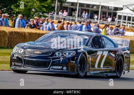 2016 Chevrolet SS NASCAR mit Fahrer Ed Berrier im 2019 Goodwood Festival der Geschwindigkeit, Sussex, UK Stockfoto