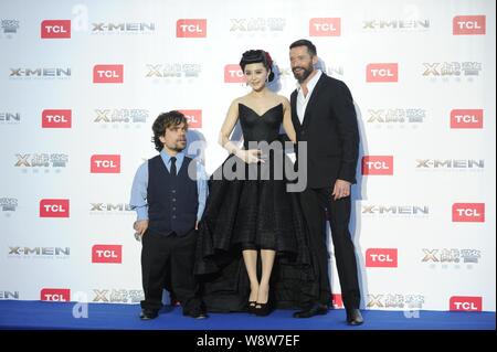 (Von links) amerikanischer Schauspieler Peter Dinklage, chinesische Schauspielerin Fan Bingbing und australischen Schauspieler Hugh Jackman Pose während einer Premiere für ihren neuen Film, Stockfoto