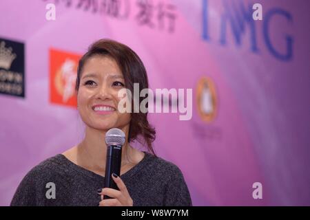 ---- Chinese Tennis star Li Na lächelt während einer Pressekonferenz für ihre Autobiographie, mein Leben in Peking, China, 22. Februar 2014. Chinesische tenn Stockfoto
