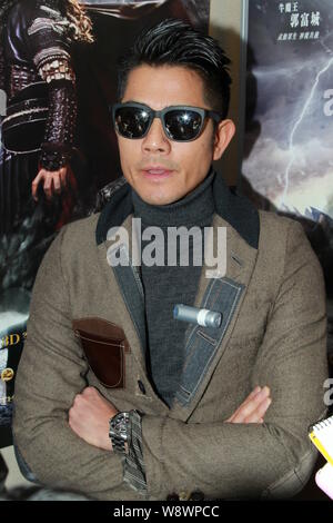 Hong Kong Sänger und Schauspieler Aaron Kwok stellt während einer Konferenz für chinesische Filme in Hong Kong, China, 22. Januar 2014. Stockfoto